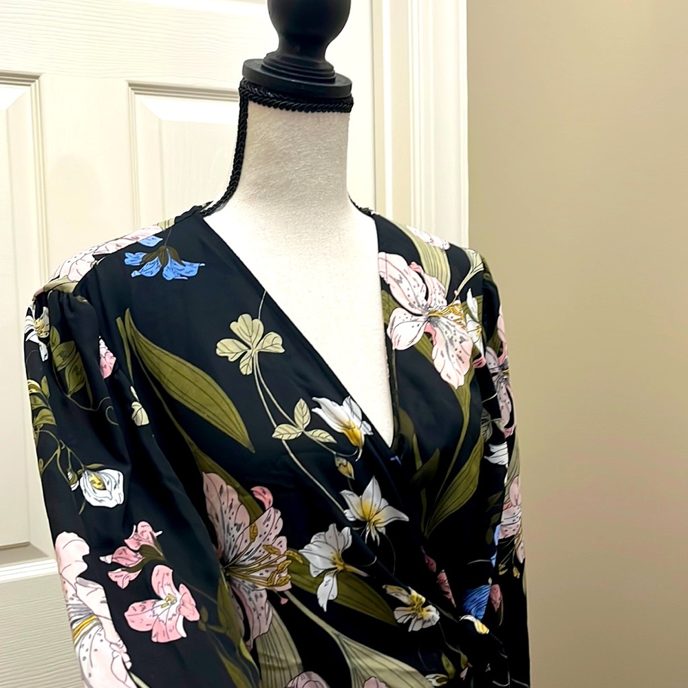 Midi wrap dress flowy with ruffled tulip hem. Night out. Belted on side